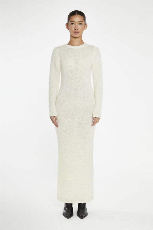 beige bodycon knitted maxi-dress with a crew neck and long sleeves. wardrobe essentials