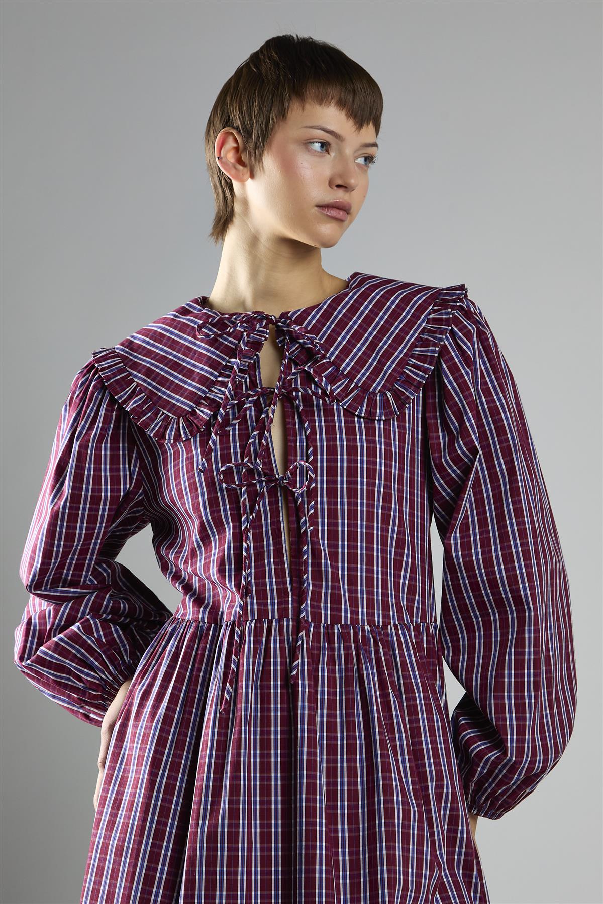 purple plaid dress with tie front detail and flap collar Jenna Ortega inspired dress