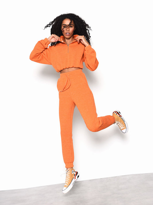 Orange best sale sweatsuit womens